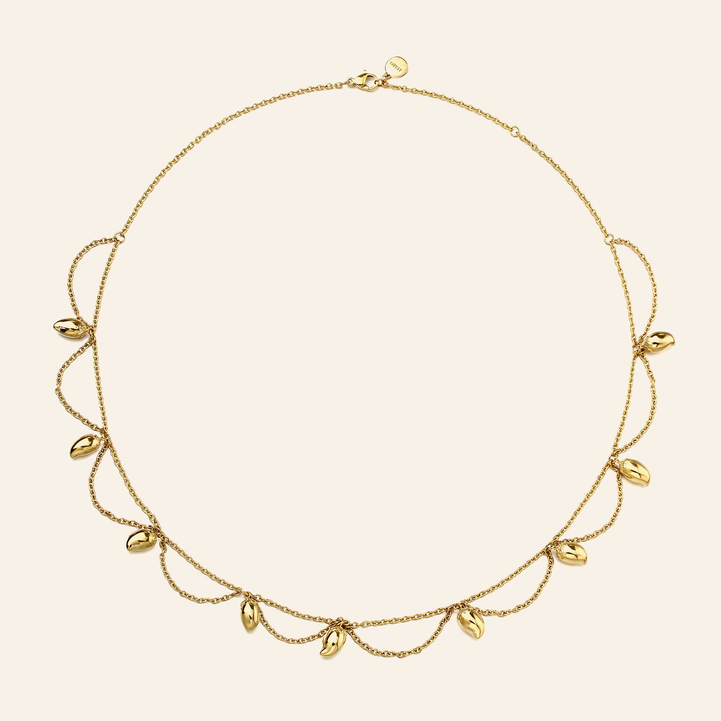 A delicate gold necklace with a fine chain and multiple small mango charms, displayed on a light cream background.